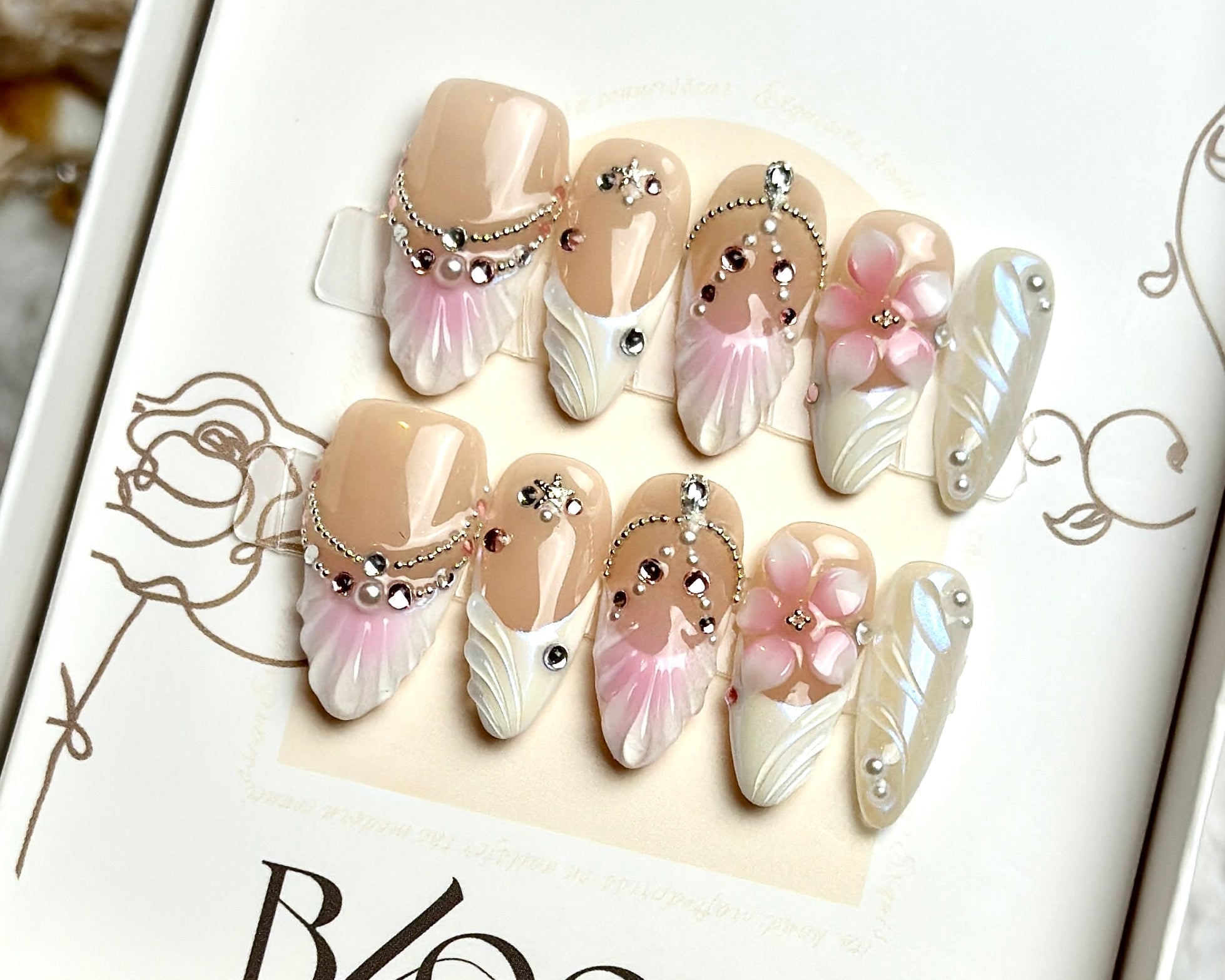 The Pearl Throne handmade medium stiletto press-on nails by Bloom Nails