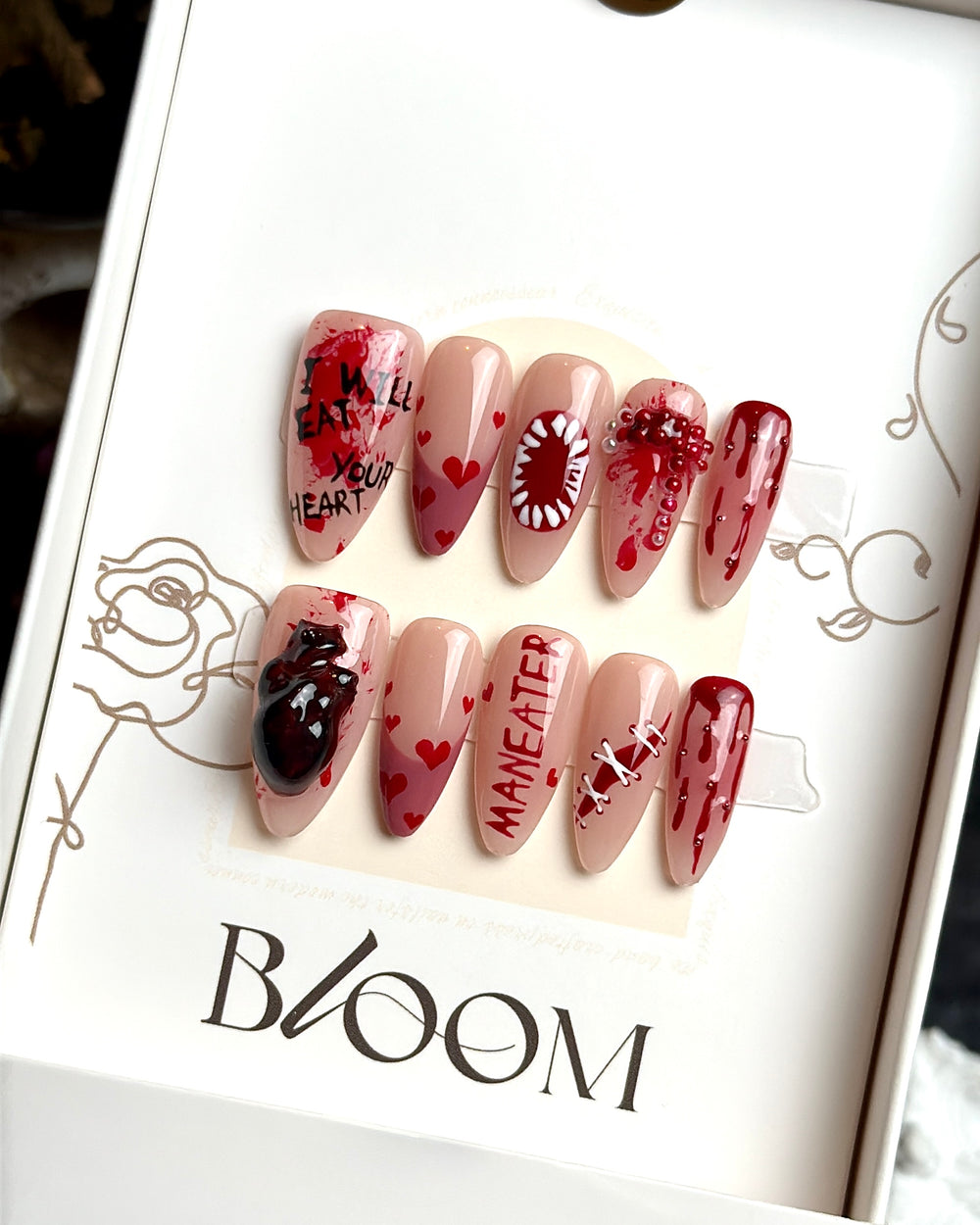 Man-eater handmade medium stiletto press-on nails by Bloom Nails