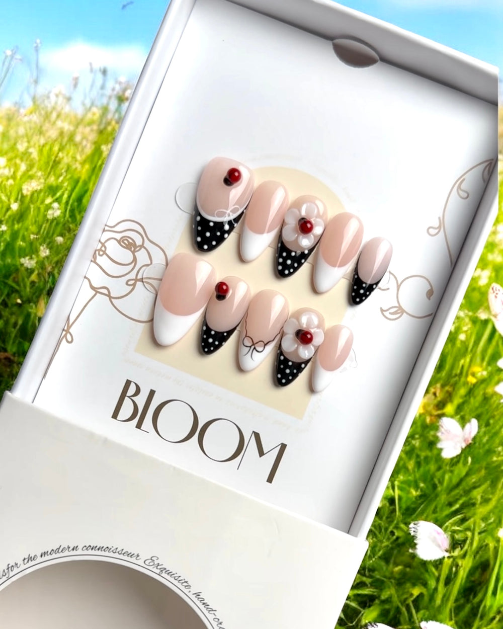 Lovie Bug handmade medium almond press-on nails by Bloom Nails
