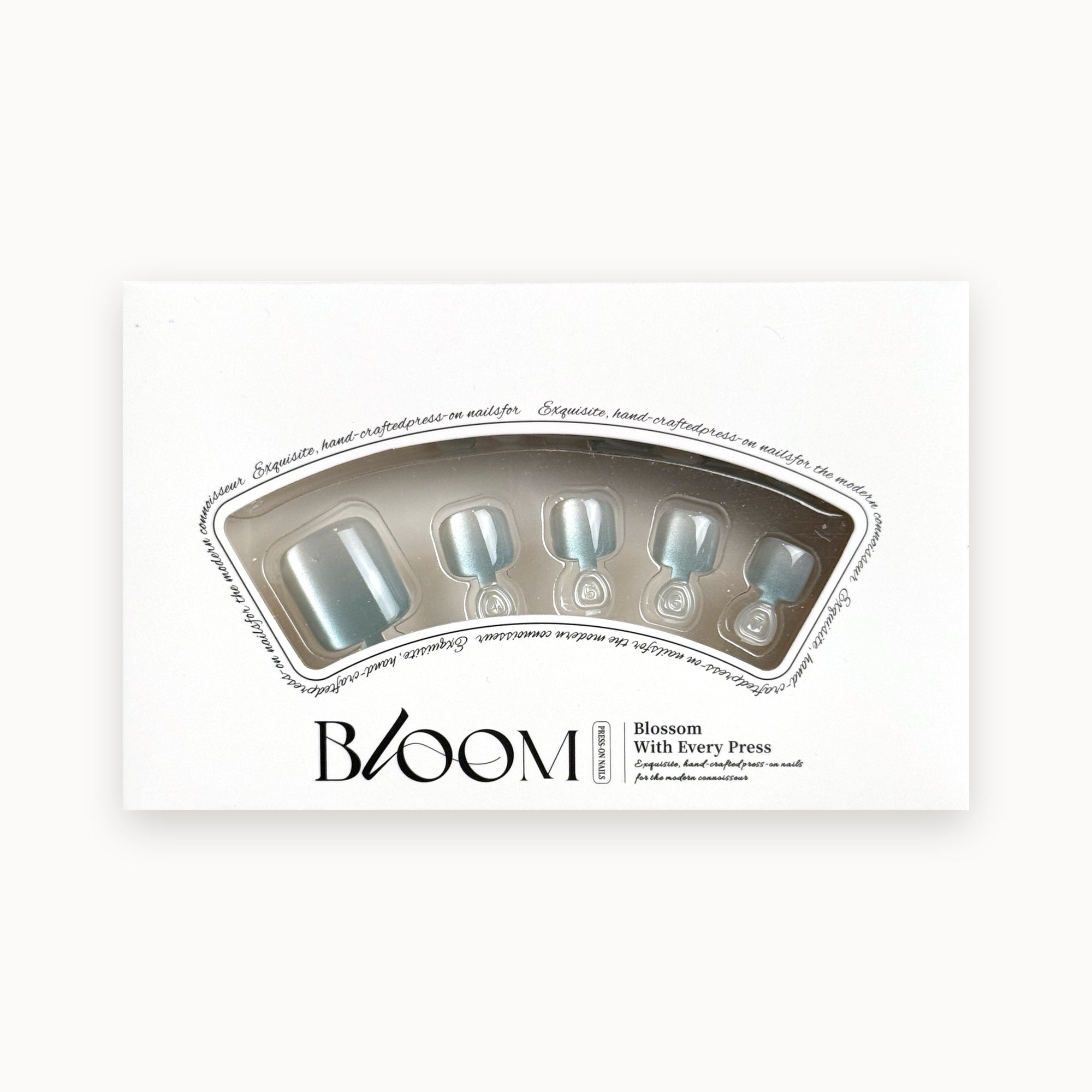Bloom Blue Reverie press-on toenails (frosty blue cat-eye) in the Bloom box